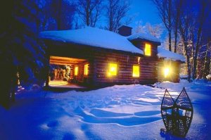 log cabin night winter-Voyageur Quest